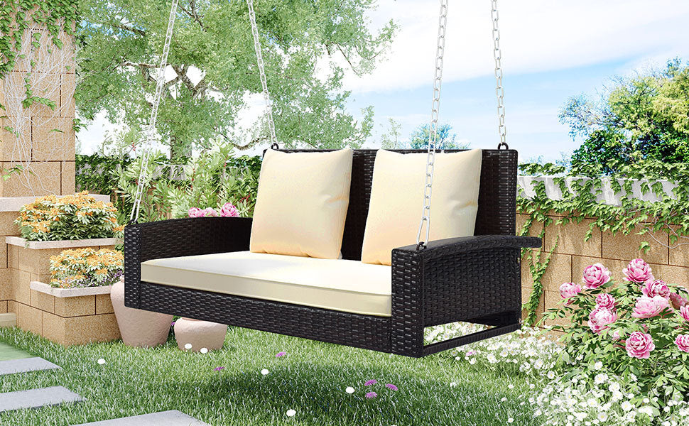 2-Person Wicker Hanging Porch Swing with Chains, Cushion, Pillow, Rattan Swing Bench for Garden, Backyard, Pond. (Brown Wicker, Beige Cushion)